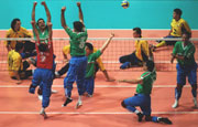Iran team celebrate winning the Iran v Bosnia Gold medal match at the 2000 Paralympic Games.  Adam Pretty/Allsport