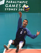 Siegmund Soicke of Germany serves during the Men's Sitting Volleyball preliminary match against Netherlands at the 2000 Paralympic Games  Matt Turner/Allsport