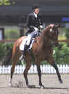 Kebbie Cannon of USA on her mount ''New Idea'' in the Grade IV mixed individual freestyle Dressage during the Sydney 2000 Paralympic Games in Sydney.  Matt Turner / Allsport