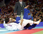 Picture of judokas competing. Joint technique. Photograph  Bob Willingham, IJF Photographer
