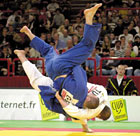 Picture of judokas competing. Side sacrifice technique. Photograph  Bob Willingham, IJF Photographer