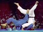 Picture of judokas competing. Supine sacrifice technique. Photo: Allsport